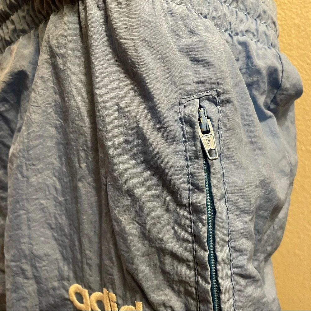 Vintage 90s Adidas Nylon Blue Men's Track Pants with All Countries Flag Tag - L